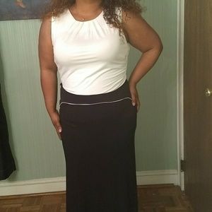 White sleeveless Shirt w/ long Black trumpet skirt